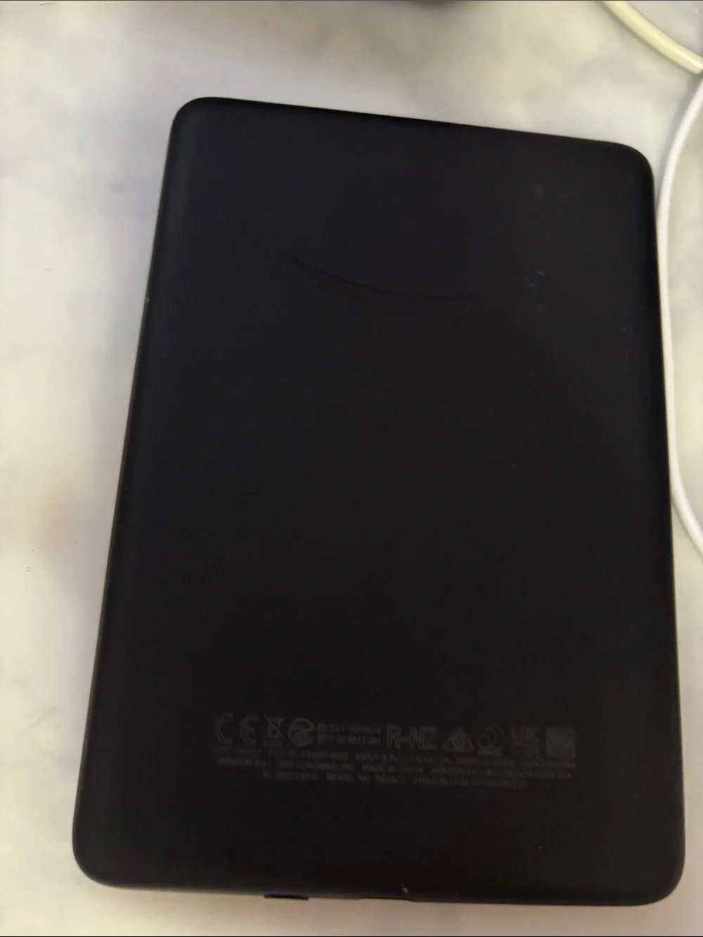 Amazon Kindle Gen 11 16GB E-Reader in Black with a clear case